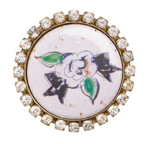 chanel sautoir fantaisie|Chanel camellia brooches.